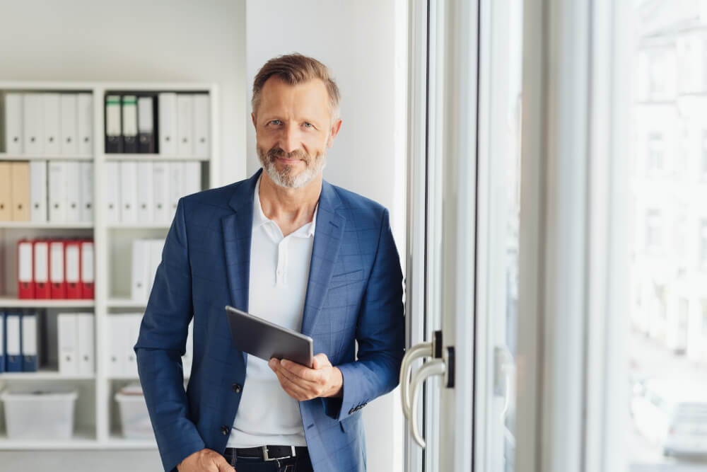 Smart relaxed confident senior businessman